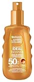 Garnier UV-Sonnenschutzspray für eine strahlende Bräune, Sehr hoher Sonnenschutz mit LSF 50, Wasserfest, Ambre Solaire Ideal Bronze Milk-in-Spray, 1 x 150 ml