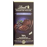 Lindt Edelbitter Mousse Tafel Schwarze Johannisbeere, dunkle Schokolade mit einer Füllung aus schwarzer Johannisbeere auf dunkler Mousse au Chocolat, glutenfrei, laktosefrei, 150g