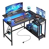 Bestier Eckschreibtisch mit USB-Ladeanschluss und Steckdose, 106 cm Gaming Tisch L Form, Kleiner Schreibtisch mit Regal & Monitorständer, Links und rechts tauschen, für Büro, Schlafraum, Schwarz