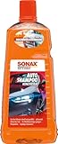 SONAX AutoShampoo Konzentrat (2 Liter) durchdringt und löst...